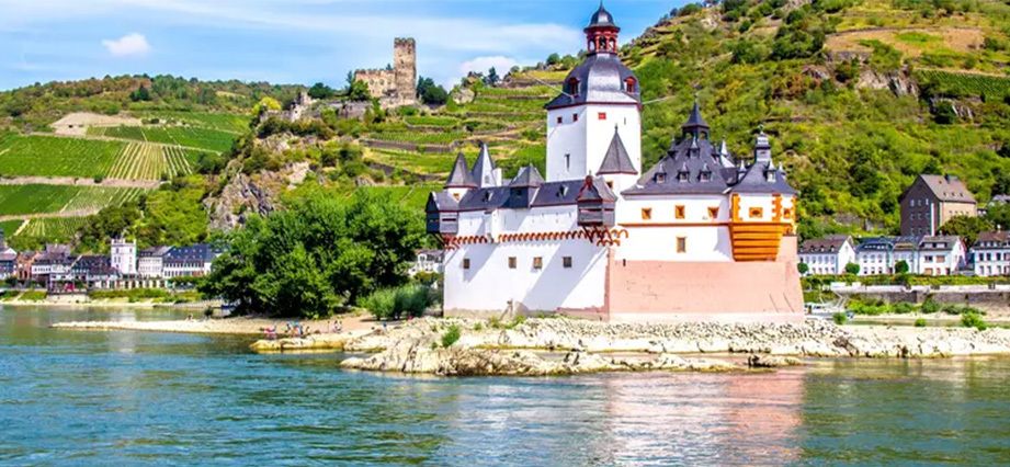 Pfalzgrafenstein toll castle on its island in the Rhine at Kaub, where the river gauge watched for Amsterdam to Budapest river cruise water levels stands
